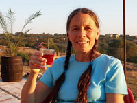 Jane with a glass of Rakia