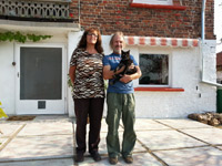 Kate & Martin outside their house